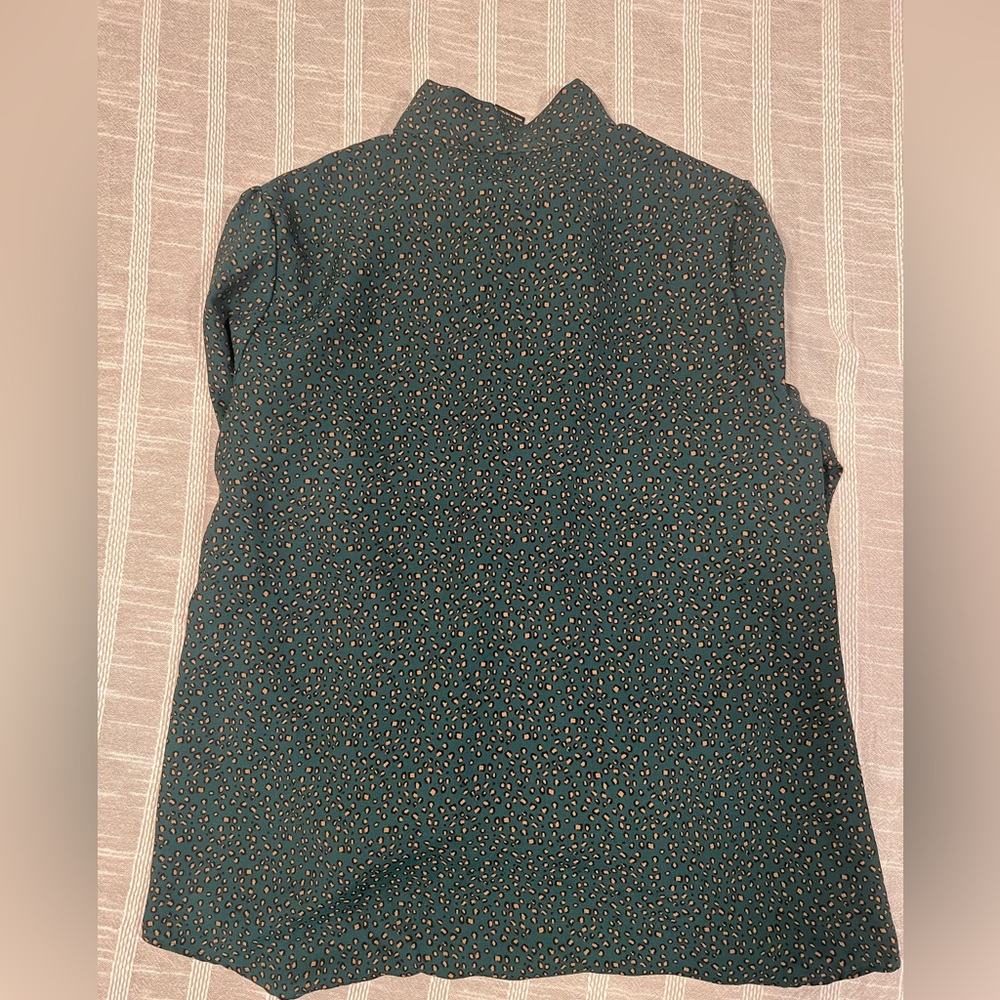 INVESTMENTS Green with animal print blouse